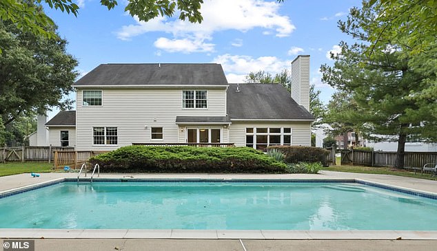 An affordable mansion for sale in Baltimore is a stately seven-bedroom Georgian mansion that has a cozy library and a sun-drenched porch, all in a 5,374-square-foot home listed for $995,000.