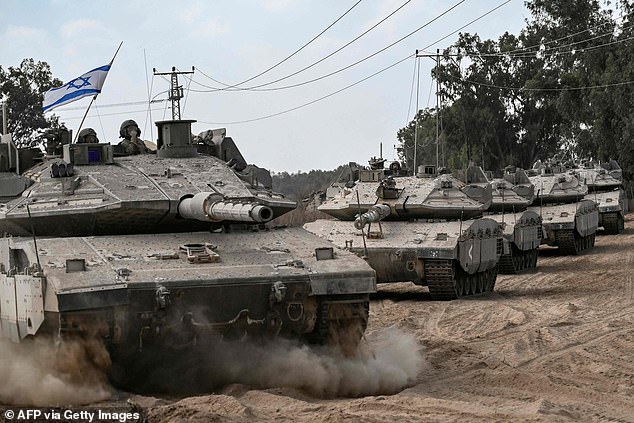 Israel is sending in columns of tanks to deploy along the border with the Gaza Strip ahead of a planned ground invasion