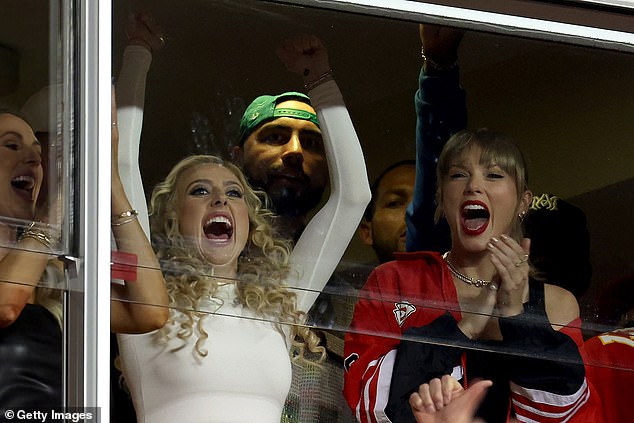 She was seen celebrating with Patrick Mahomes' wife Brittany (left) that night