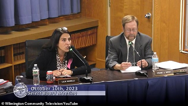 A Massachusetts city councilman was seen on video yelling at an anti-vaxxer and storming out of the council meeting after being accused of a conflict of interest.