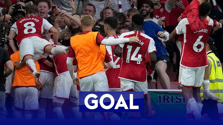 Gabriel Martinelli's deflected strike gives Arsenal a late 1-0 lead over Manchester City.