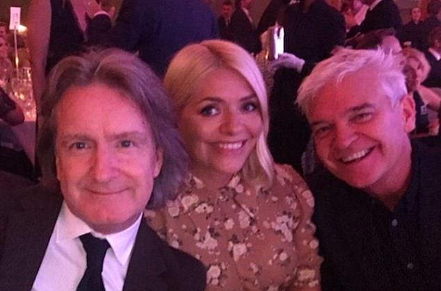 Martin Frizzell with Philip Schofield and Holly Willoughby at the 2019 TV Choice Awards.