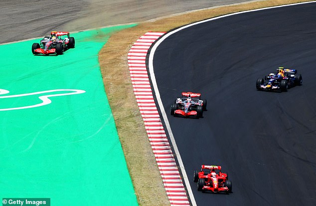 The 2007 Brazilian Grand Prix where Hamilton (above left) lost the title in the final race to Kimi Raikkonen's Ferrari (below) is one of the five hottest races of all time