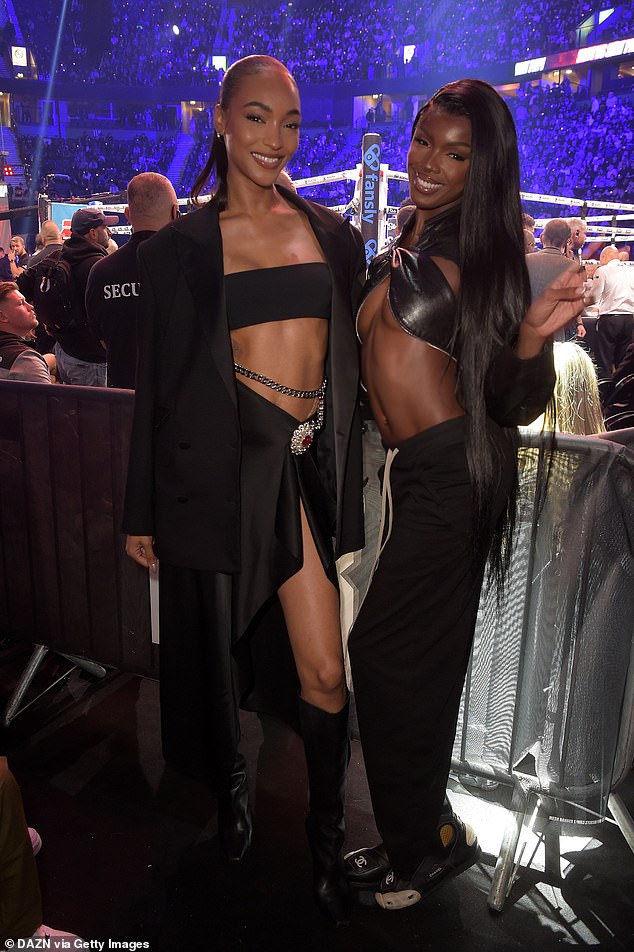 Famous friends: Models Jourdan (left) and Leomie (right) posed together at the AO Arena in Manchester before the fight