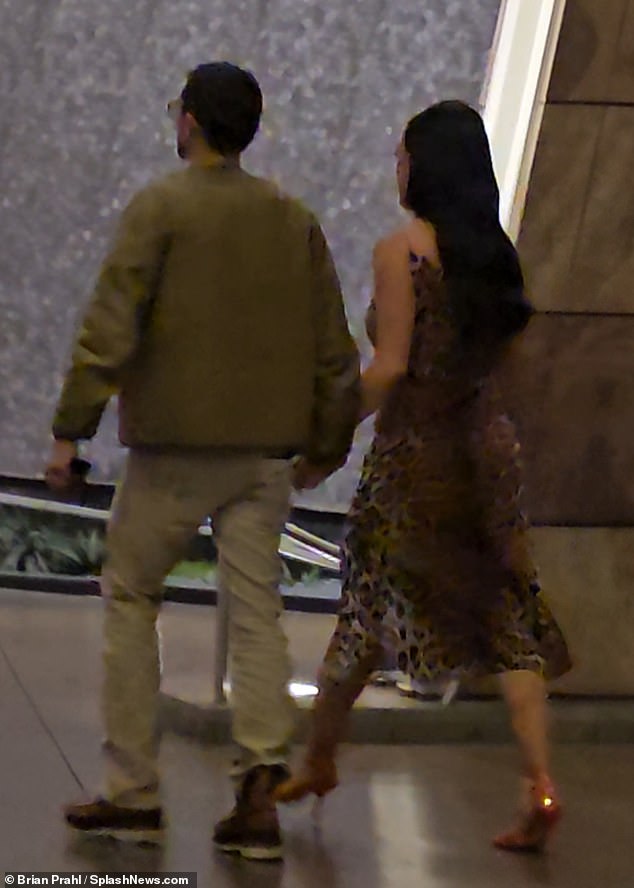 Tight: Perry and Bloom subtly showed their love and care for each other as they held hands