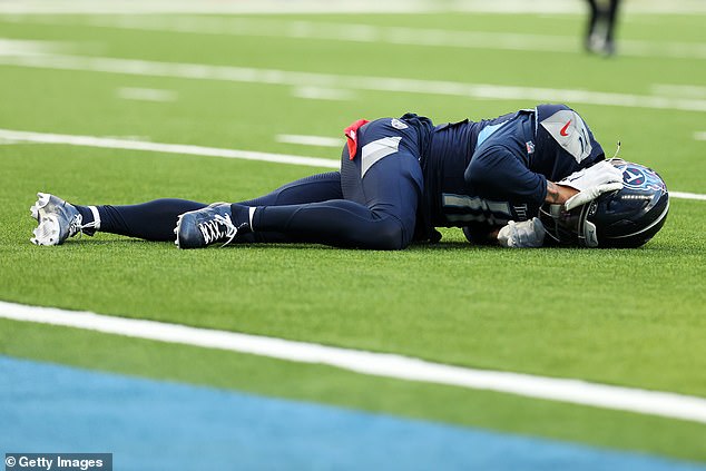 Moore remained on the turf before going to the locker room after recovering from the hit.