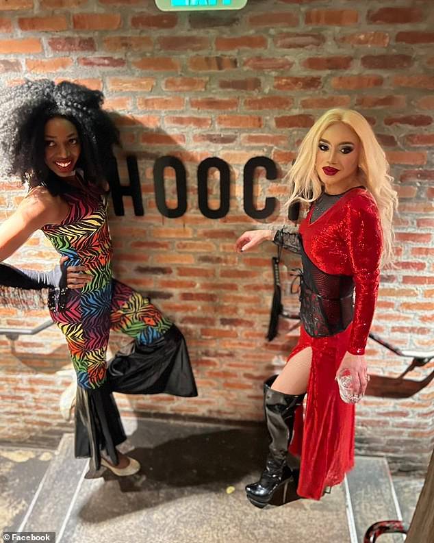 Artists from Hooch's drag show pose in the trans-friendly bar earlier this year