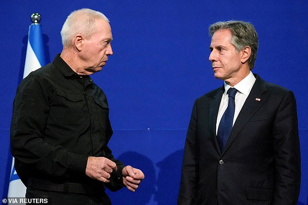 Secretary of State Antony Blinken listens as Israeli Defense Minister Yoav Gallant speaks at The Kirya, Israel's Ministry of Defense, in Tel Aviv, Israel, on October 16, 2023. Blinken and Israeli Prime Minister Benjamin Netanyahu were forced to withdraw during his visit in a bomb shelter