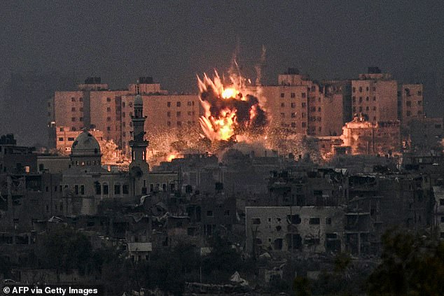 A fireball erupts on Saturday during the Israeli bombardment of the northern Gaza Strip