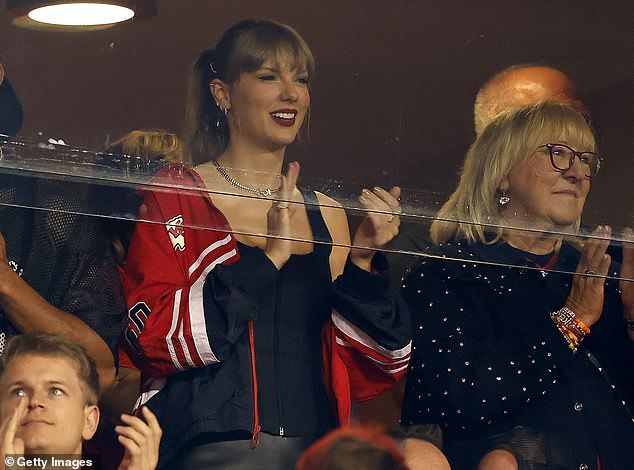 The pop star cheered on her new boyfriend at three Chiefs games with his mother, Donna (R)