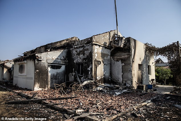 Homes are destroyed after clashes between Israeli and Palestinian forces in Be'eri, Israel on October 14