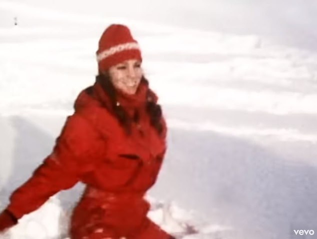 The campaign was reminiscent of Mariah's All I Want For Christmas Is You music video - in which the singer plays with wrapped presents and enjoys a snowy landscape