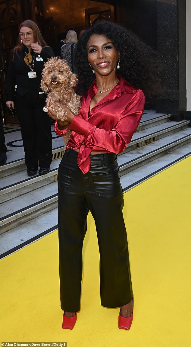 Awkward: It comes after Sinitta allegedly ruffled Jackie St Clair's feathers earlier this year after she brought her toy poodle, Scarlett O'Hara, to the former glamor model's 64th birthday (Sinitta and her dog pictured in July)