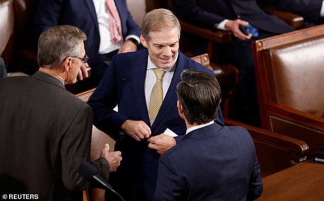 House Judiciary Committee Chairman Rep. Jim Jordan, the top contender in the race to become the next Speaker of the U.S. House of Representatives, talks with House colleagues