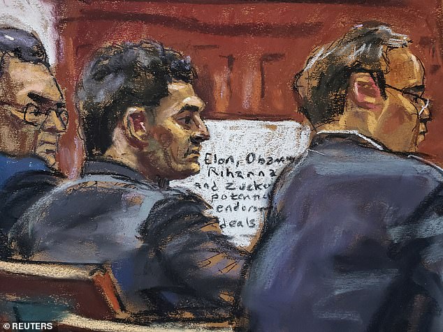 Sam Bankman-Fried sits between his lawyers Mark Cohen and Christian Everdell during his fraud trial over the collapse of FTX, the bankrupt cryptocurrency exchange, in Federal Court in New York