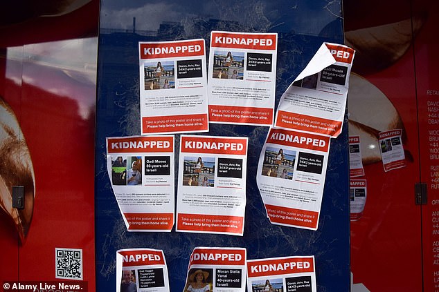 Pro-Israel supporters have put up posters showing people kidnapped by terrorist group Hamas in last week's attacks