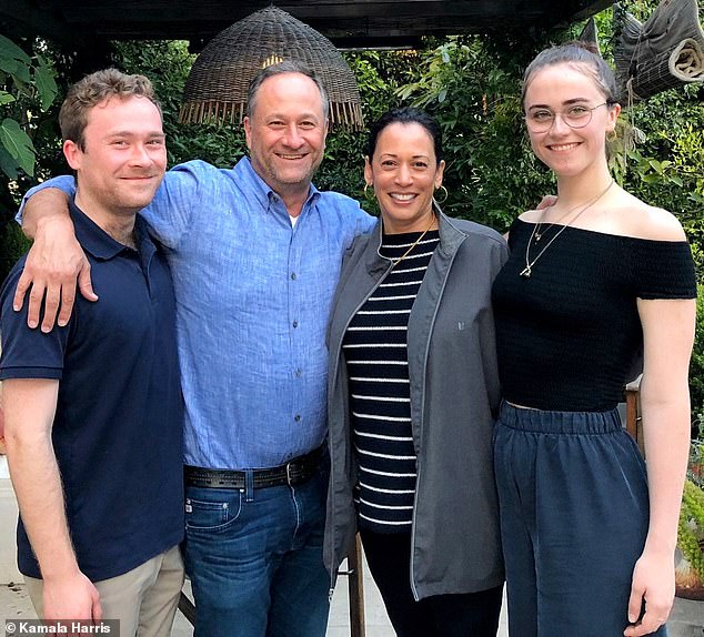 Both 'Momala' and Second Gentleman Doug Emhoff were present.  Cole is pictured with father Doug, stepmother Kamala and sister Ella