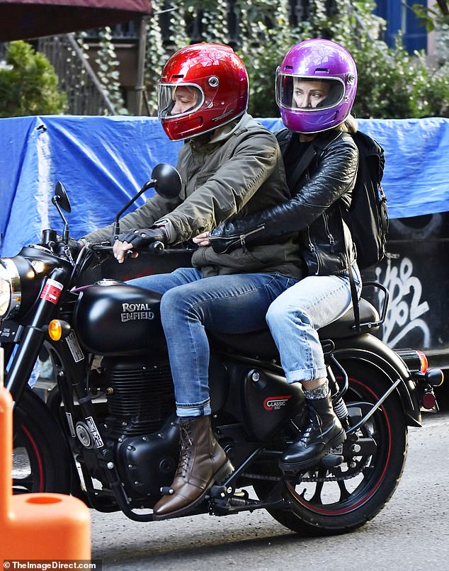 The former GMA3 co-hosts were seen in their best motorcycle gear astride Holmes' new helicopter