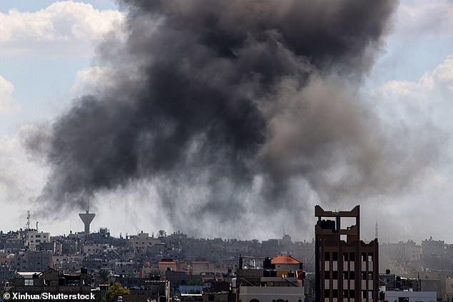 Smoke rises after Israeli airstrikes in the southern Gaza Strip town of Khan Yunis on October 15, 2023