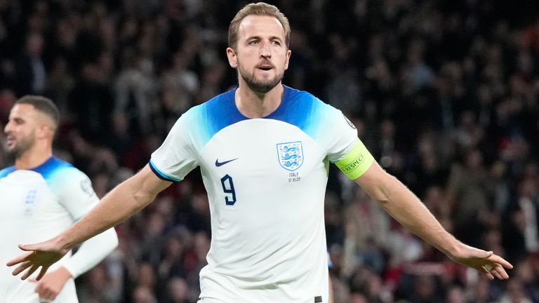 England's Harry Kane celebrates after scoring his side's opening goal from a penalty during the Euro 2024 Group C qualifying match between England and Italy at Wembley Stadium in London, Tuesday, October 17, 2023. (AP Photo/Frank Augstein)