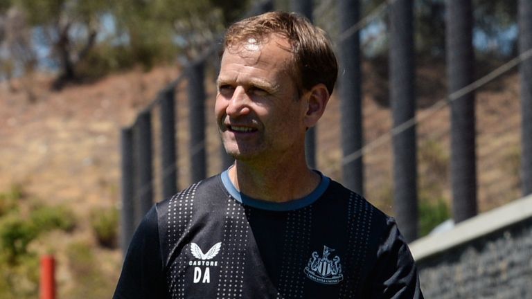 LISBON, PORTUGAL – JULY 23: Newcastle United sporting director Dan Ashworth pulls a drinks cart during pre-season training with Burnley FC at the Portuguese Football Federation Cidade do Futebol on July 23, 2022 in Lisbon, Portugal.  (Photo by Serena Taylor/Newcastle United via Getty Images)