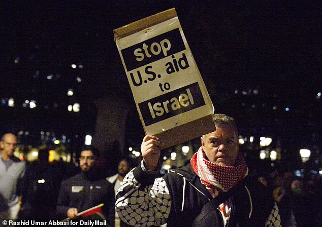 Some protesters held signs demanding that the US cut funding to Israel