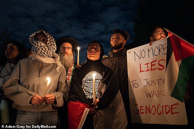 Supporters of Palestine attend a vigil in Washington Square Park, Manhattan