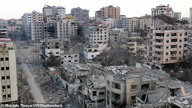 Aerial photo taken by a drone shows the destruction in the middle of Gaza City on Tuesday