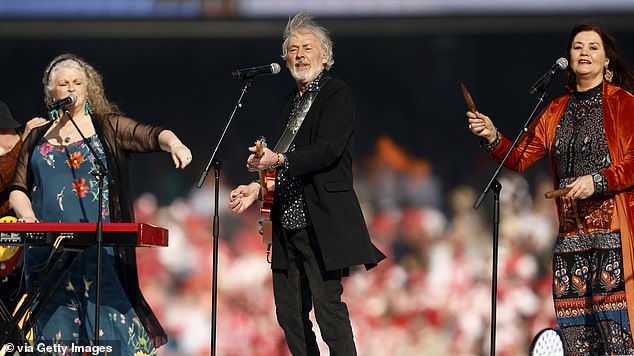 Howard (pictured centre) said he 'can't be proud of my country' after the Voice referendum disaster