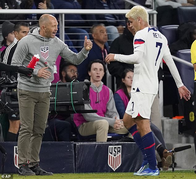 American manager Gregg Berhalter (L) removed Reyna, who had just returned from an injury, at half time