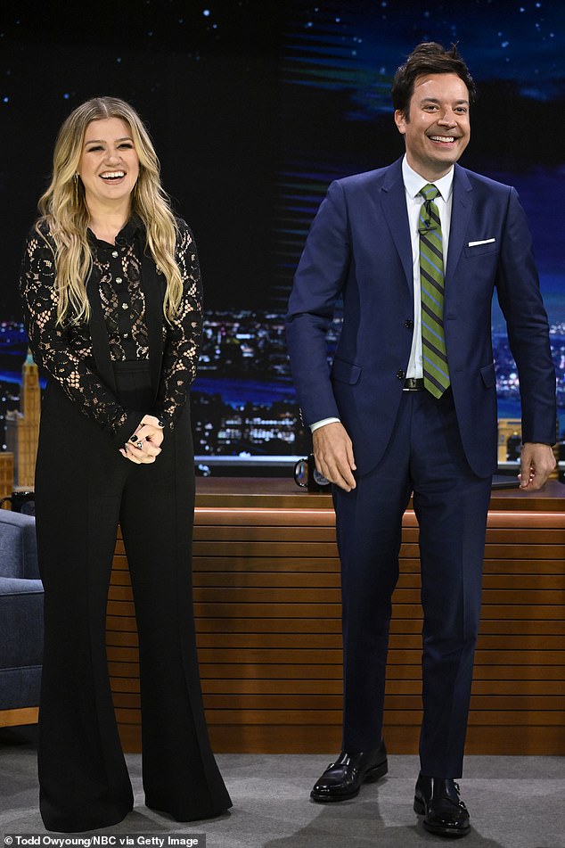 Wow: In the photo, the singer, 41 — who went through a bitter divorce from ex Brandon Blackstock, 46, in 2021 — wowed in a black lace top and matching black pants as she prepared to perform on Jimmy Fallon;  seen on the show