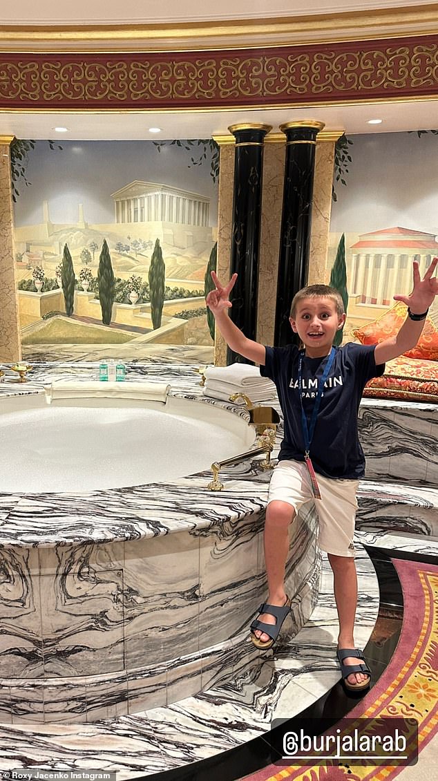 She then posted a photo of Hunter next to a giant marble bath, with the young boy once again dwarfed by the enormous facilities.