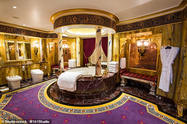 The Royal Suite also features an elaborate marble jacuzzi with pillars