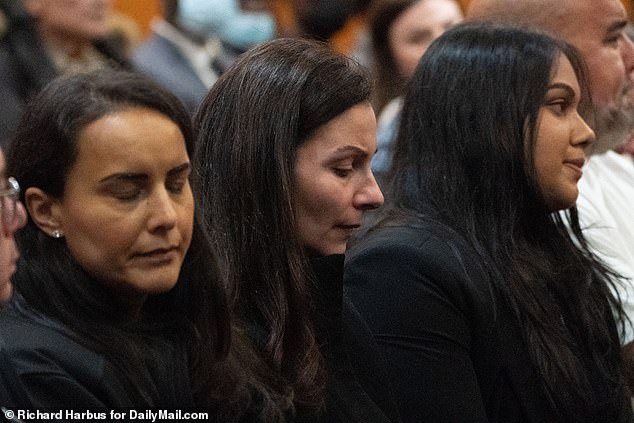 Tsakos' widow was temporarily escorted from the courtroom when she collapsed, before prosecutors showed crime scene photos of the officer's broken body