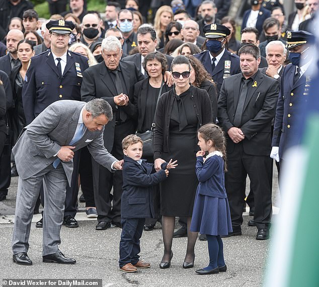 Irene (pictured with their two young children) paid tribute to her husband and said she hoped she had 'made him proud'