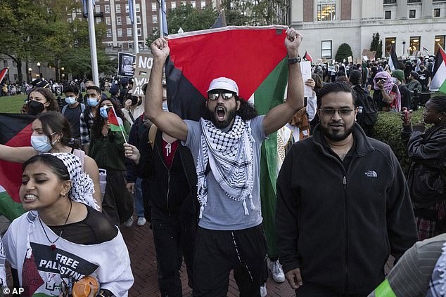 The Hamas paraglider has replaced Che Guevara or Angela Davis as the new symbol of fashionable left-wing radicalism.  (Above) Palestinian supporters march near Columbia University on October 12, 2023