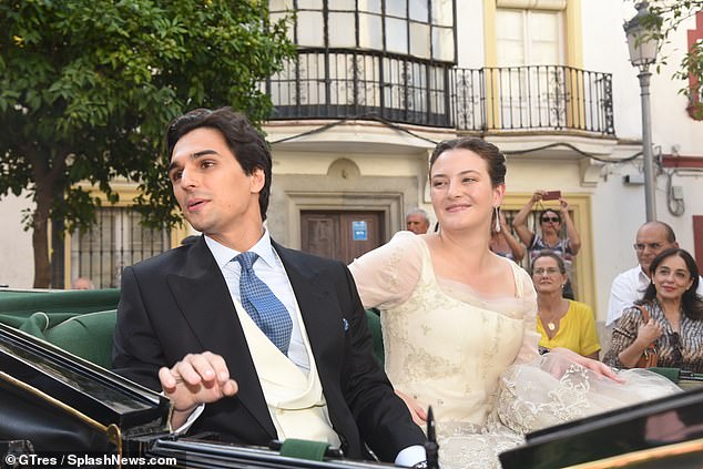 The happy couple left the Iglesia de San Miguel in the city of Jerez de la Frontera in a horse-drawn carriage