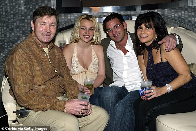 Teenage years: Britney claimed she was allowed to drink alcohol when she was as young as eighth grade (the singer pictured with father Jamie, brother Bryan and mother Lynne in 2006)