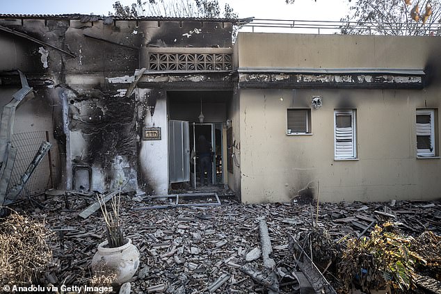 A kibbutz member climbed out of the safe room window after his house was set on fire (as pictured above) with his infant daughter in his arms;  both were shot in cold blood while his wife and daughter were kidnapped