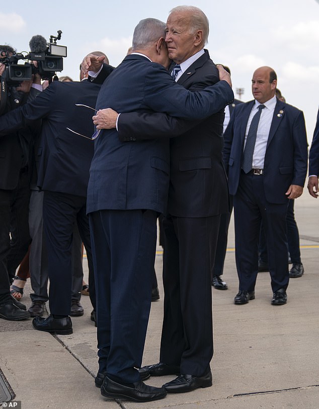 President Joe Biden is greeted by Israeli Prime Minister Benjamin Netanyahu after arriving at Ben Gurion International Airport, Wednesday, October 18, 2023, in Tel Aviv