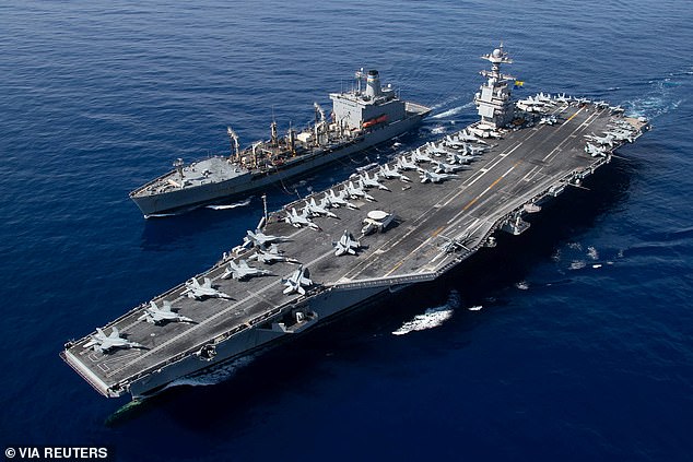 The world's largest aircraft carrier USS Gerald R. Ford steams alongside USNS Laramie in the Eastern Mediterranean