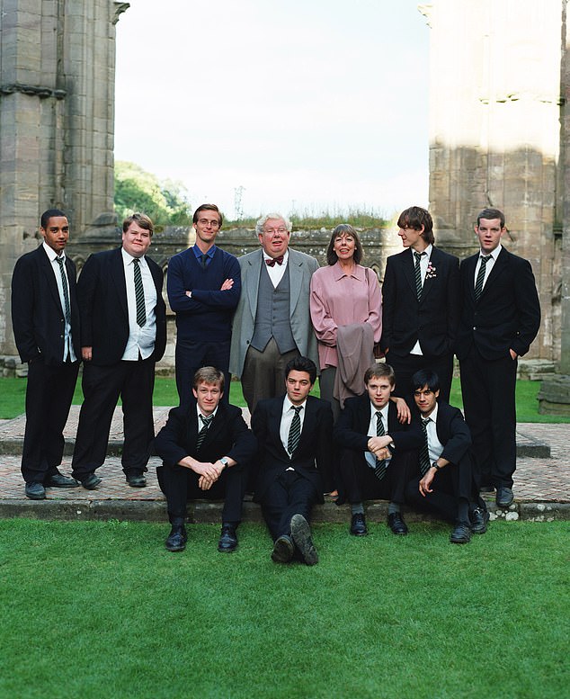 Shared history: Dominic, 46, played student Stuart Dakin, (front row second left) the leader of the schoolboys, while Stephen, 46, played temporary history teacher Tom Irvine (back row third left) in the 2006 film.