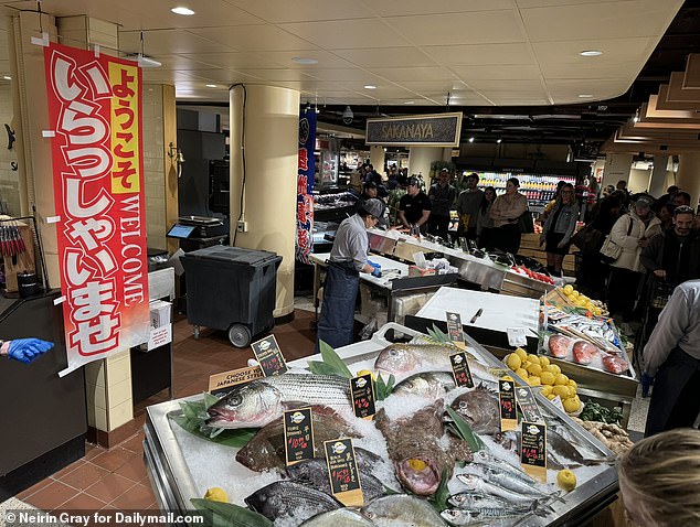 Pictured is a fresh seafood stand on the lower level of the new 80,000-square-foot Wegmans store in Manhattan.  It is staffed with 600 new employees and is stocked with a variety of stand-alone concessions, selling fresh sushi, salads, sandwiches, hot sandwiches, soups and pizza.