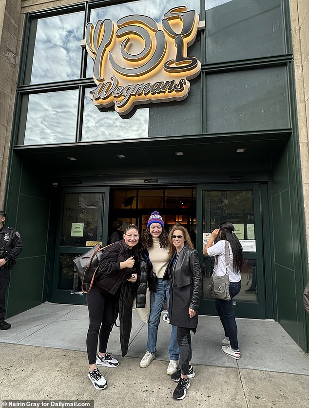 'Wegmaniancs': Katie Gold (center), 26, and her friend (left) grew up in Rochester, New York, where Wegmans was founded in 1916.  Sharon Singer (right), 62, wrote Wegmans a letter many years ago requesting it be opened in New Jersey