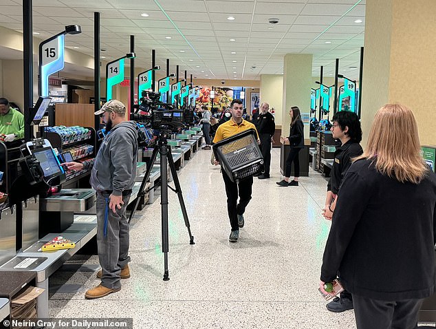 In addition to the cash registers, the store is full of dozens of self-checkout machines.  It also has a shared entrance and exit