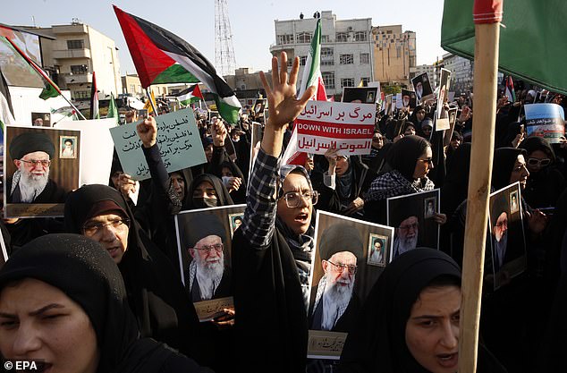 Iranian protesters show solidarity with Gaza during an anti-Israel demonstration in Tehran