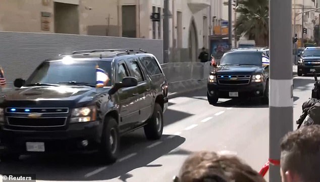 Biden's motorcade makes its way through Tel Aviv on Wednesday morning.  The city's air raid sirens remained silent during the visit