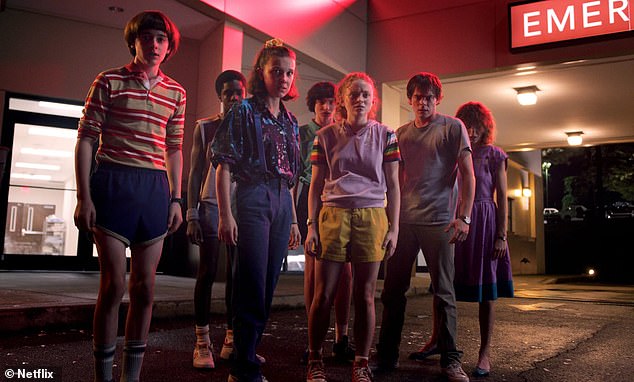 In an earnings report on Wednesday, Netflix announced that its ad-supported offering is gaining popularity, with membership growing by nearly 70 percent in the quarter.  In the photo: cast from Netflix hit Stranger Things