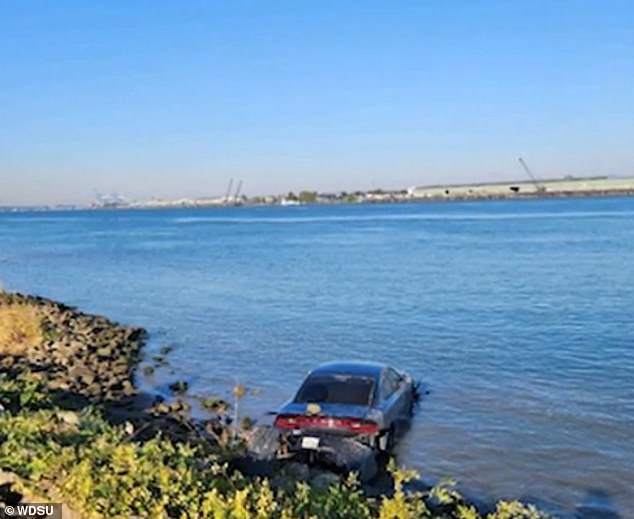 The suspected Dodge Charger he used to escape was found floating in the river near a terminal on Wednesday morning