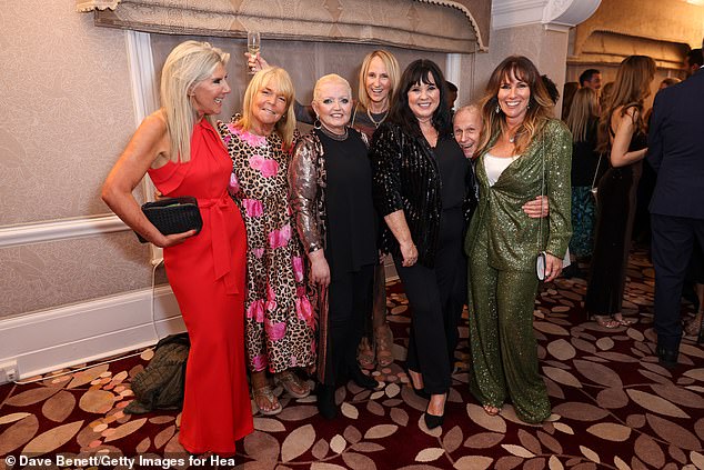 Group shot: The star also posed for a group shot with Coleen and Linda alongside fellow Loose Women Linda Robson and Carol McGiffin, while British dancer Wayne Sleep also cheekily stuck his head in a group shot with the ladies